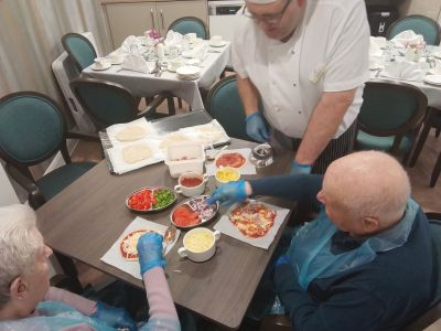 Pizza Day Brings Joy to Arkall Manor Residents