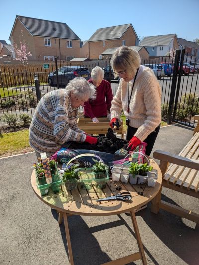 Harbour Manor Residents Bloom with Joy in Gardening Club
