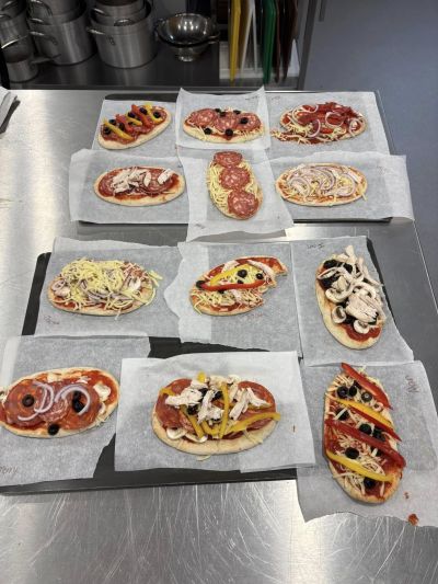 Pizza Day Brings Joy and Togetherness at Waterhouse Manor