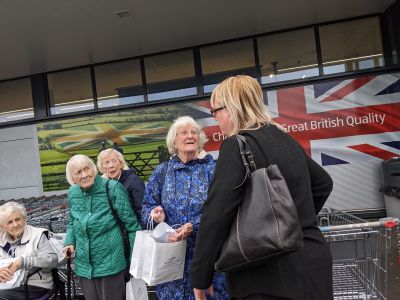 Residents of Old Norse Lodge Share Joy with Goodie Bags